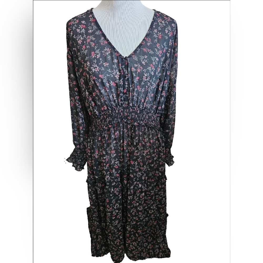 Beautiful floral plus-size dress with smocked sleeve and waist line size XXL.